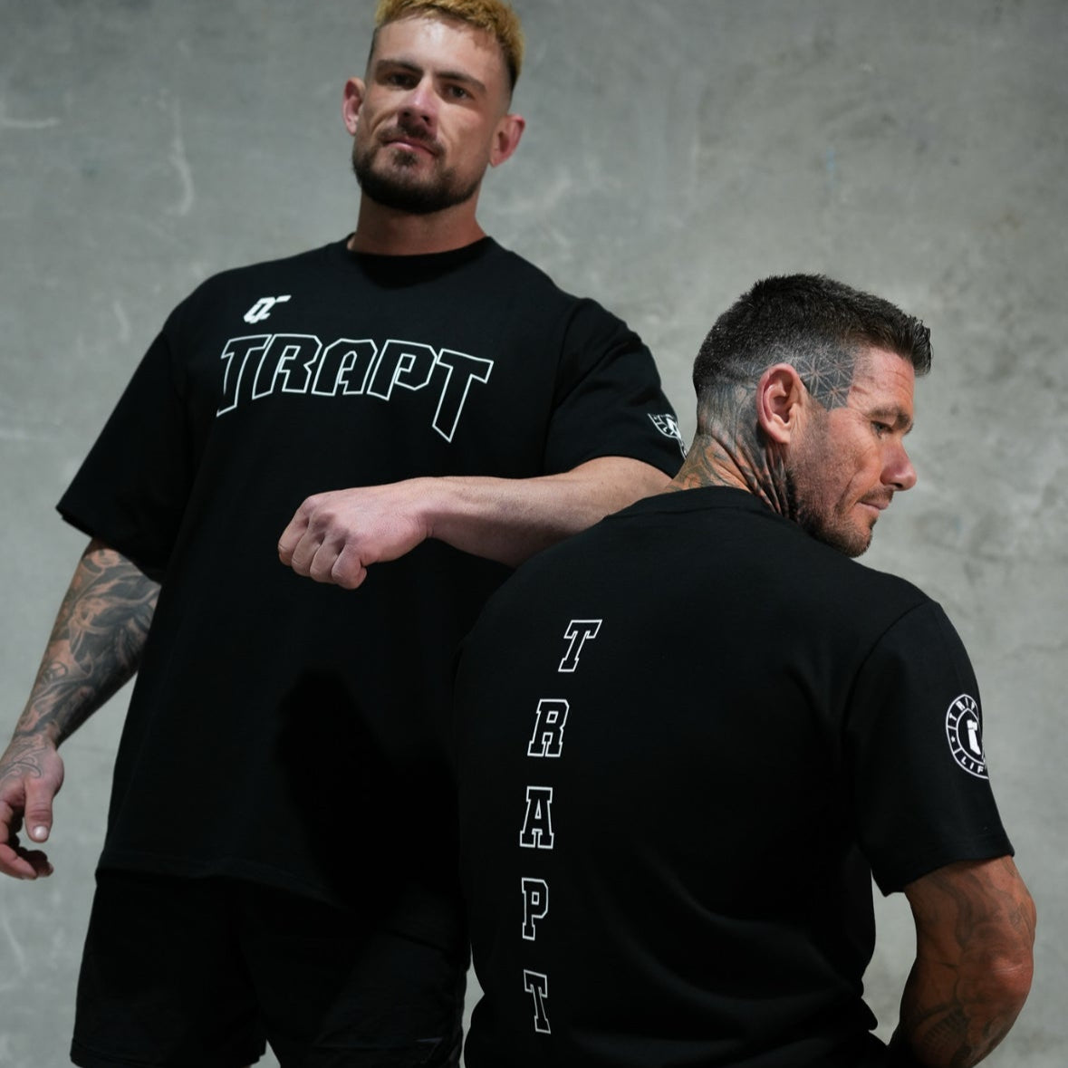 2 men TRAPTLIFTWEAR shirt 