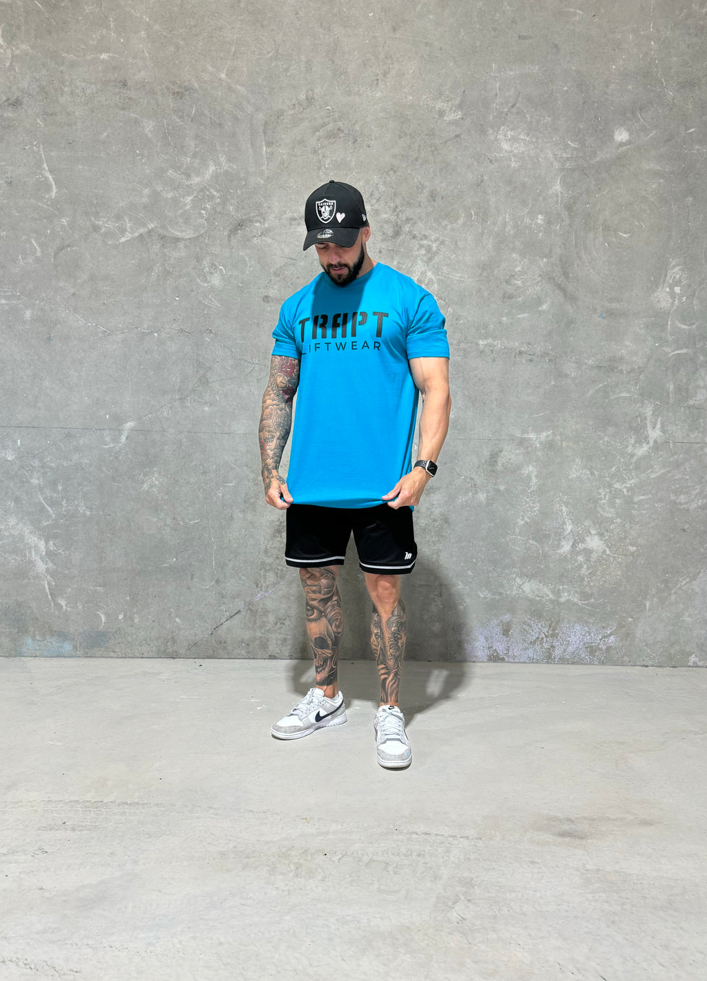 Teal with black writing TRAPT liftwear 