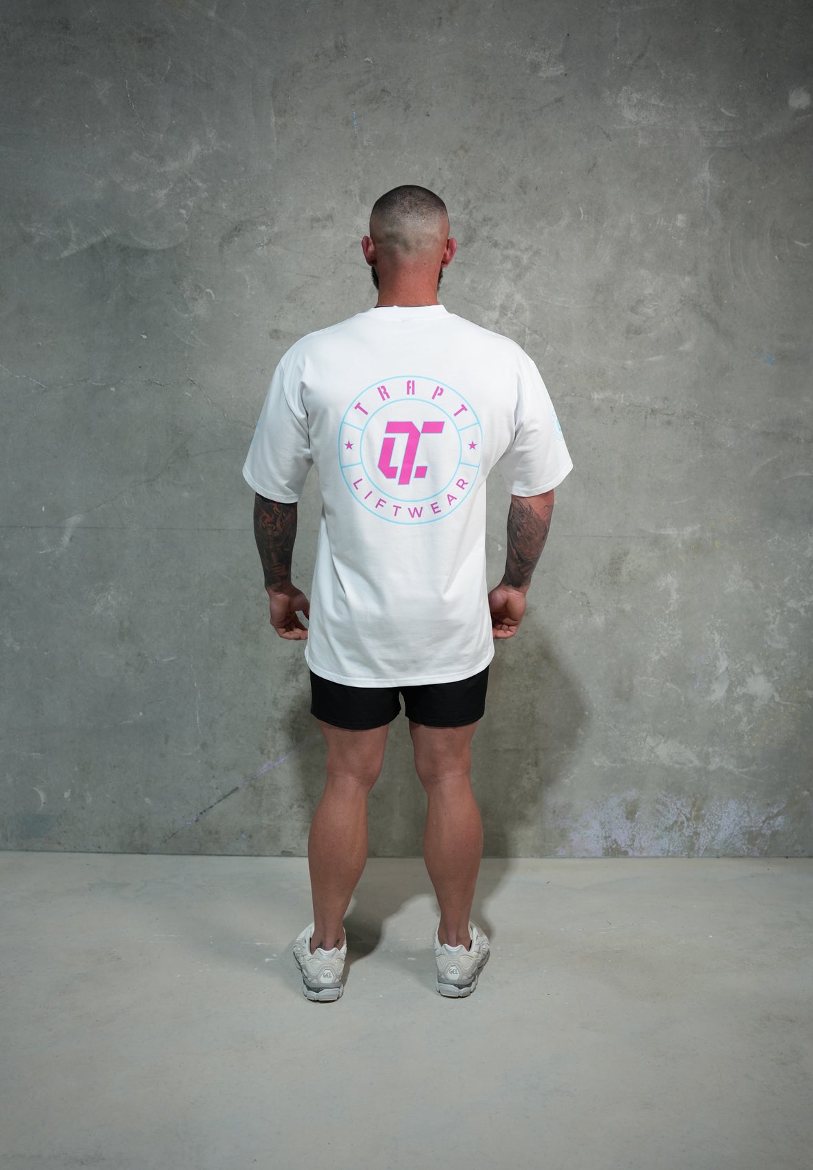 White teal and pink TRAPT oversized shirts Back